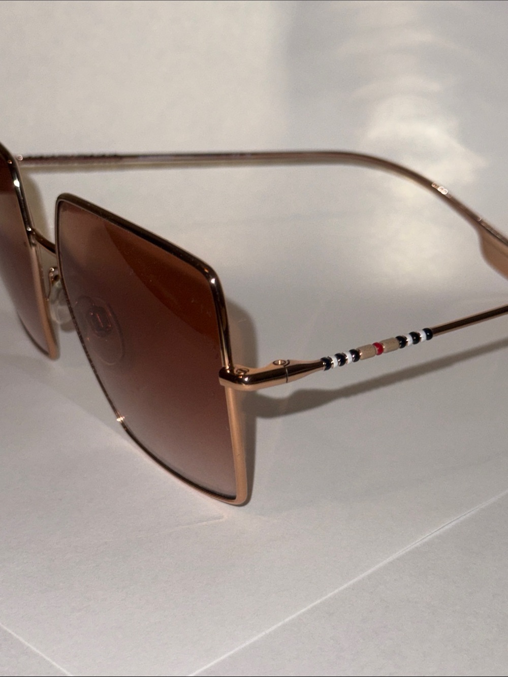 Burberry Rose Gold Metal Women's Sunglasses with Signature Stripe Temples